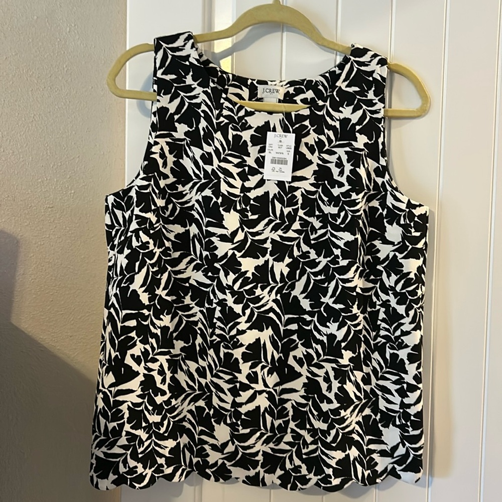 J. Crew cream/black sleeveless blouse with scalloped detailing.